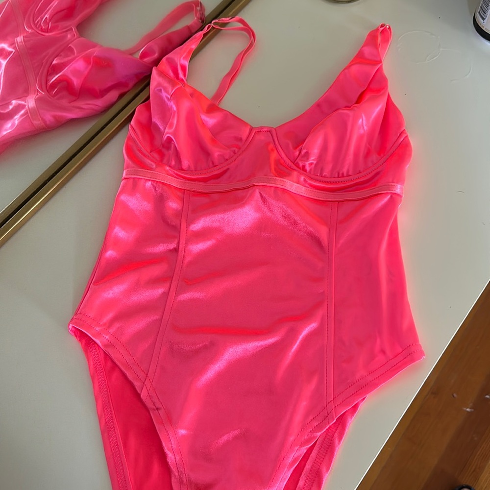 Bright pink bodysuit